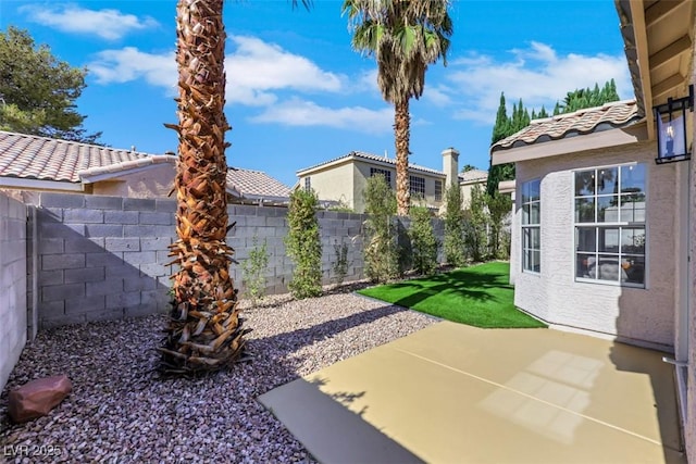 7701 Sea Cliff Way, Las Vegas, NV 89128 - fenced backyard with a patio