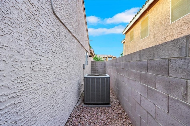 7701 Sea Cliff Way, Las Vegas, NV 89128 - view of home's exterior featuring a central AC unit and stucco siding