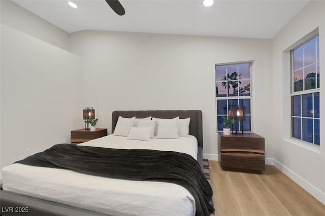 7701 Sea Cliff Way, Las Vegas, NV 89128 - bedroom featuring wood finished floors, recessed lighting, lofted ceiling, and a ceiling fan