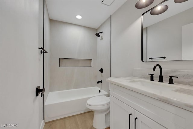 7701 Sea Cliff Way, Las Vegas, NV 89128 - full bathroom featuring vanity, wood finished floors, and washtub / shower combination