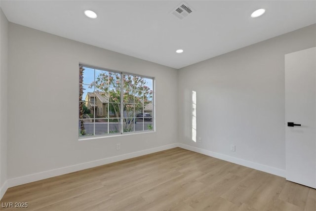 7701 Sea Cliff Way, Las Vegas, NV 89128 - spare room featuring light wood finished floors and recessed lighting