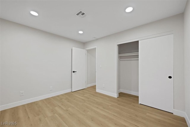 7701 Sea Cliff Way, Las Vegas, NV 89128 - unfurnished bedroom with light wood-style floors, recessed lighting, and a closet