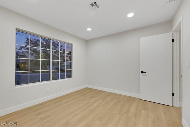 7701 Sea Cliff Way, Las Vegas, NV 89128 - spare room with light wood-type flooring, a smoke detector, and recessed lighting