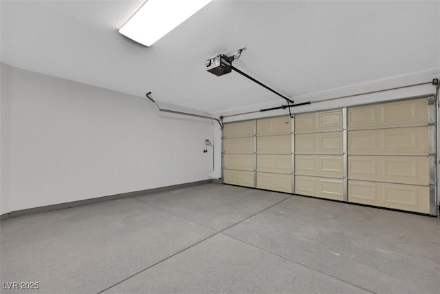 7701 Sea Cliff Way, Las Vegas, NV 89128 - garage with baseboards and a garage door opener