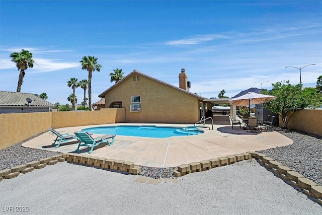 100 Crossfoot Terrace Ct, Henderson, NV 89002 - view of swimming pool featuring a fenced backyard and a patio area