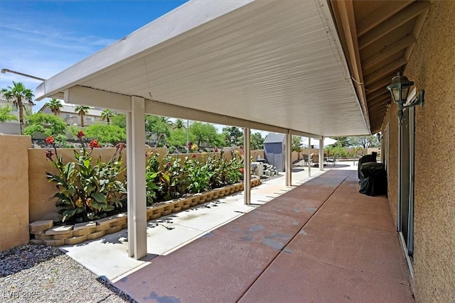 100 Crossfoot Terrace Ct, Henderson, NV 89002 - fenced backyard with a storage shed and a patio