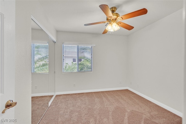 9044 Blue Raven Ave Unit R, Las Vegas, NV 89143 - carpeted spare room featuring baseboards and a ceiling fan