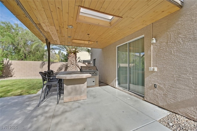 9044 Blue Raven Ave Unit R, Las Vegas, NV 89143 - view of patio / terrace with area for grilling