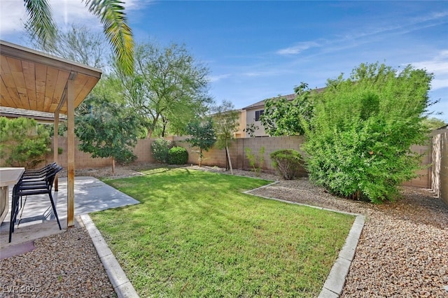 9044 Blue Raven Ave Unit R, Las Vegas, NV 89143 - fenced backyard with a patio area