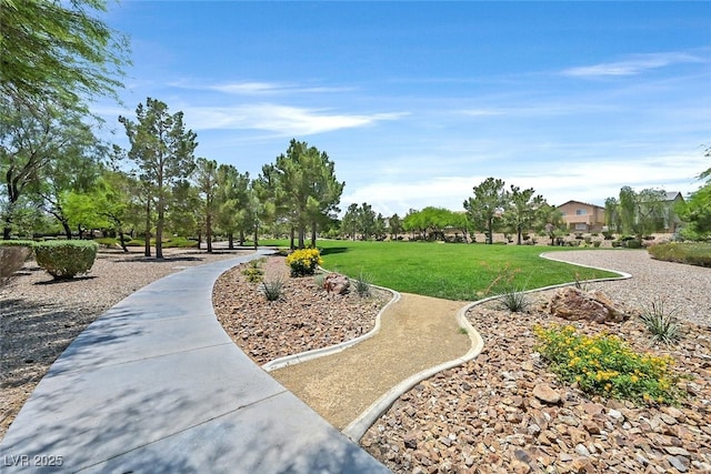 9044 Blue Raven Ave Unit R, Las Vegas, NV 89143 - view of home's community featuring a lawn