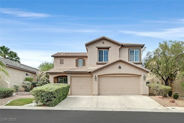 9044 Blue Raven Ave Unit R, Las Vegas, NV 89143 - traditional home featuring an attached garage, driveway, stucco siding, and a tiled roof