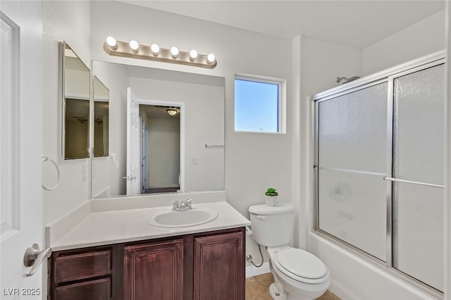 9044 Blue Raven Ave Unit R, Las Vegas, NV 89143 - bathroom featuring vanity and combined bath / shower with glass door