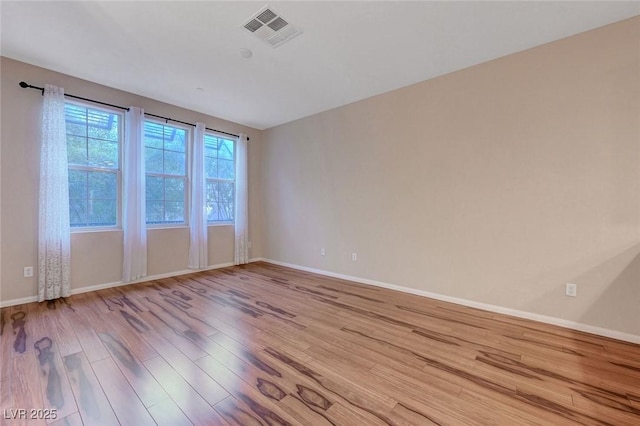 7856 Carysford Ave, Las Vegas, NV 89178 - empty room featuring wood finished floors and baseboards