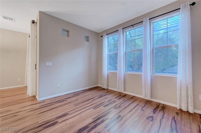 7856 Carysford Ave, Las Vegas, NV 89178 - unfurnished room featuring wood finished floors and baseboards