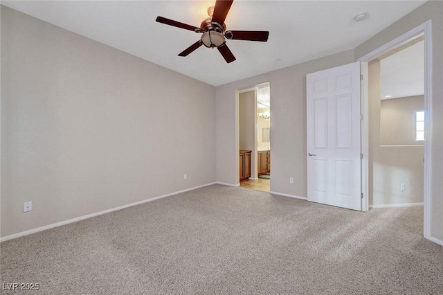 7856 Carysford Ave, Las Vegas, NV 89178 - unfurnished bedroom featuring light colored carpet, ensuite bath, and ceiling fan