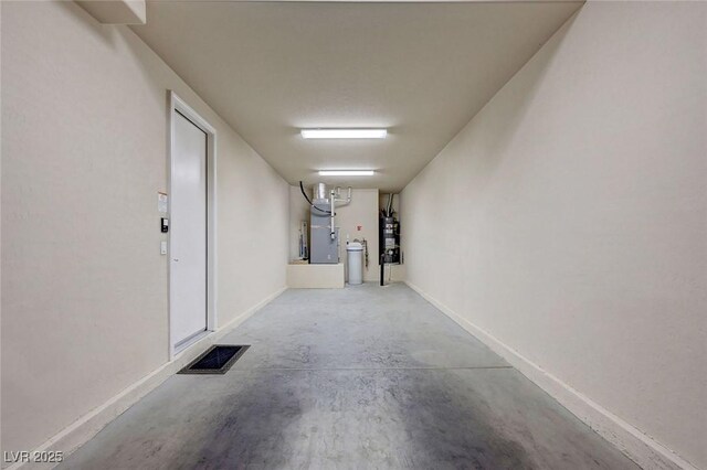 7856 Carysford Ave, Las Vegas, NV 89178 - garage with heating unit and baseboards