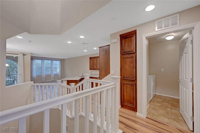 7856 Carysford Ave, Las Vegas, NV 89178 - hall featuring recessed lighting and an upstairs landing