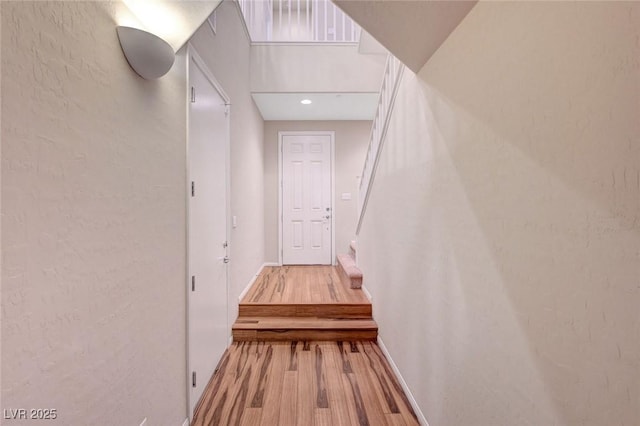7856 Carysford Ave, Las Vegas, NV 89178 - corridor with wood finished floors and stairs