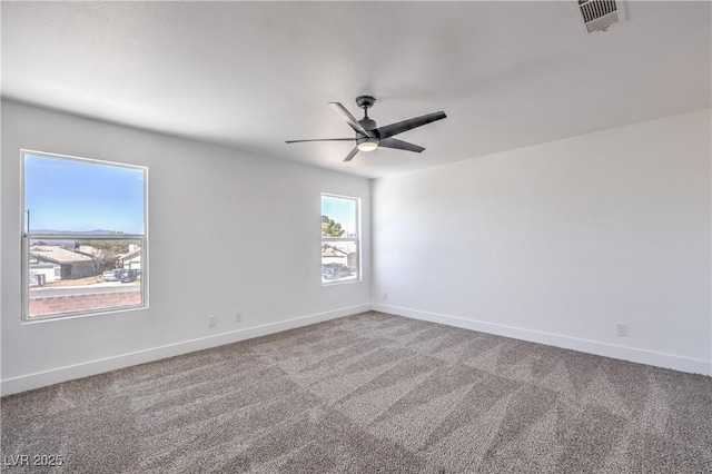 6420 Rosemount Ave, Las Vegas, NV 89156 - carpeted spare room featuring a ceiling fan and baseboards