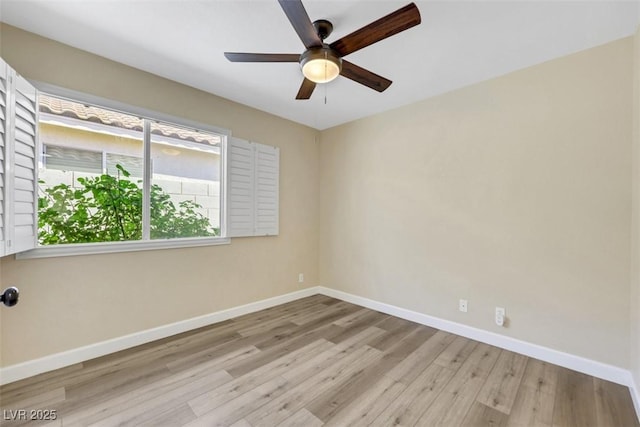 6035 Shadow Oak Dr, North Las Vegas, NV 89031 - unfurnished room with wood finished floors and ceiling fan
