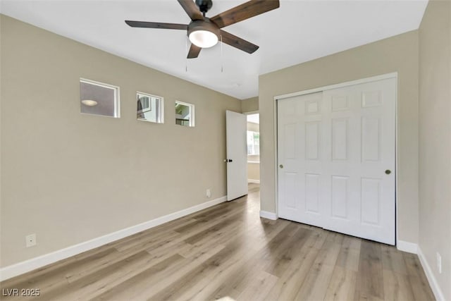 6035 Shadow Oak Dr, North Las Vegas, NV 89031 - unfurnished bedroom featuring a closet, wood finished floors, and ceiling fan