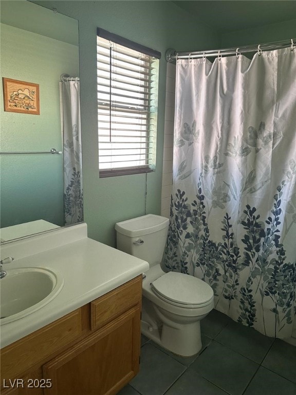6208 Mandarin Dr, Las Vegas, NV 89108 - bathroom featuring vanity, tile patterned flooring, and curtained shower