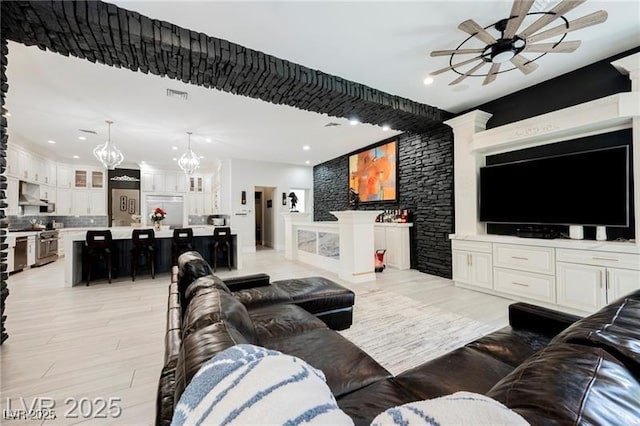 764 Ricota Ct, Henderson, NV 89012 - living area featuring ceiling fan, recessed lighting, light wood-style flooring, and a chandelier
