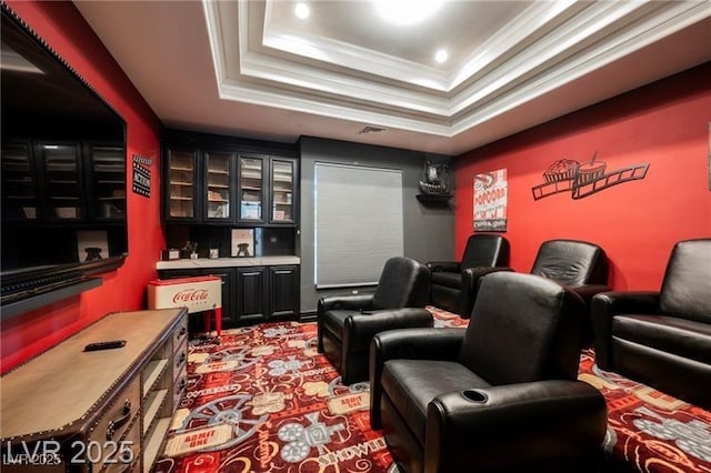 764 Ricota Ct, Henderson, NV 89012 - carpeted home theater room with a raised ceiling, ornamental molding, a dry bar, and recessed lighting