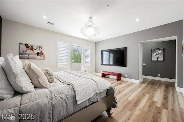 764 Ricota Ct, Henderson, NV 89012 - bedroom with light wood-style floors, a chandelier, and recessed lighting