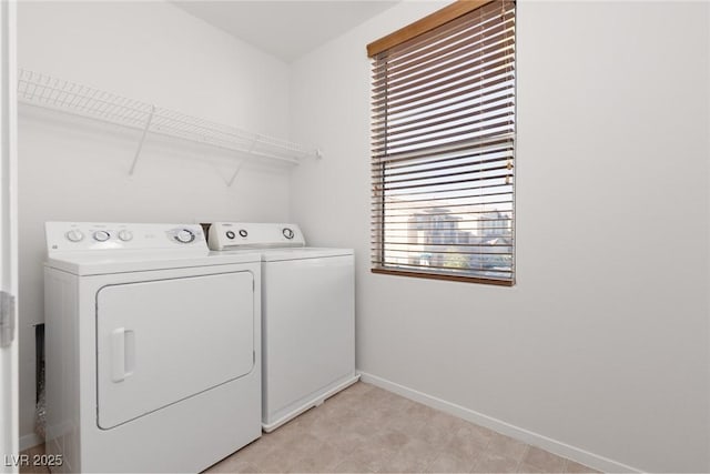 908 Shining Rose Pl, Henderson, NV 89052 - washroom featuring washing machine and clothes dryer and baseboards