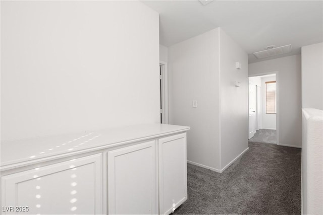 908 Shining Rose Pl, Henderson, NV 89052 - hallway featuring dark colored carpet and baseboards