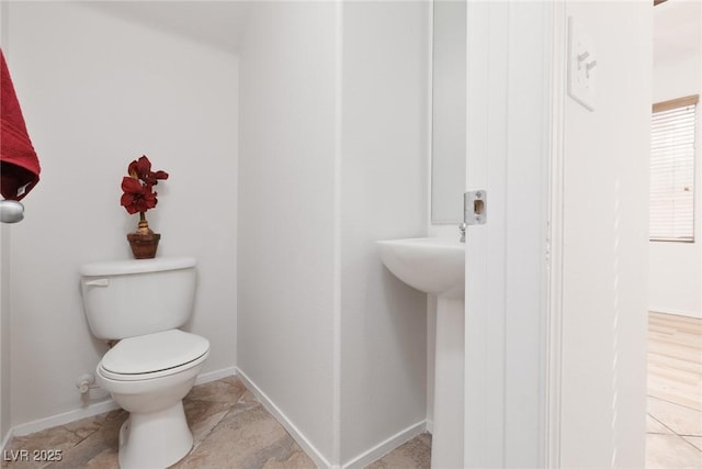 908 Shining Rose Pl, Henderson, NV 89052 - bathroom with toilet and baseboards