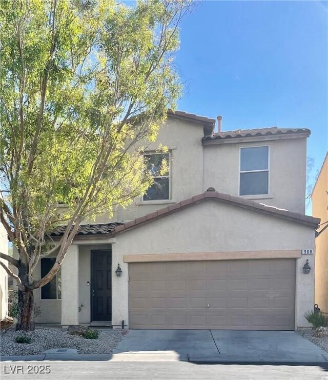 908 Shining Rose Pl, Henderson, NV 89052 - view of front of home featuring a garage, a tiled roof, stucco siding, and concrete driveway