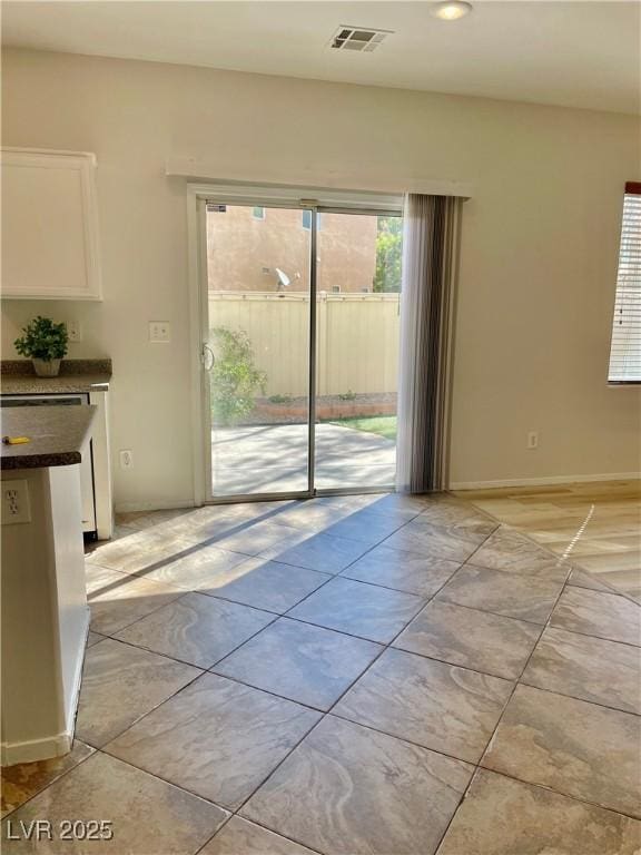908 Shining Rose Pl, Henderson, NV 89052 - unfurnished dining area featuring light tile patterned floors and recessed lighting