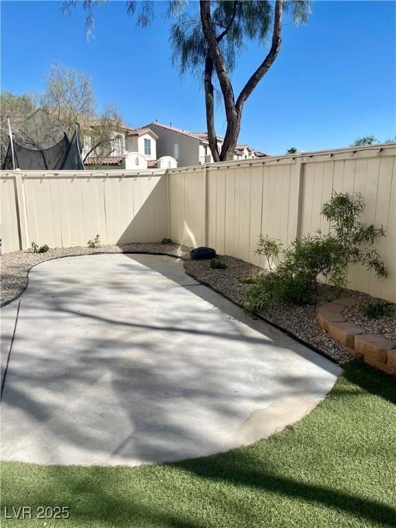 908 Shining Rose Pl, Henderson, NV 89052 - fenced backyard featuring a patio