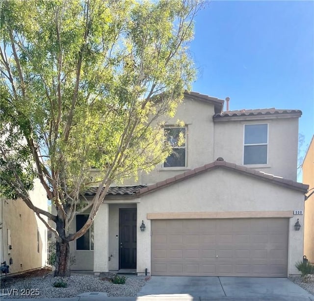 908 Shining Rose Pl, Henderson, NV 89052 - view of front of property with a tile roof, an attached garage, stucco siding, and concrete driveway