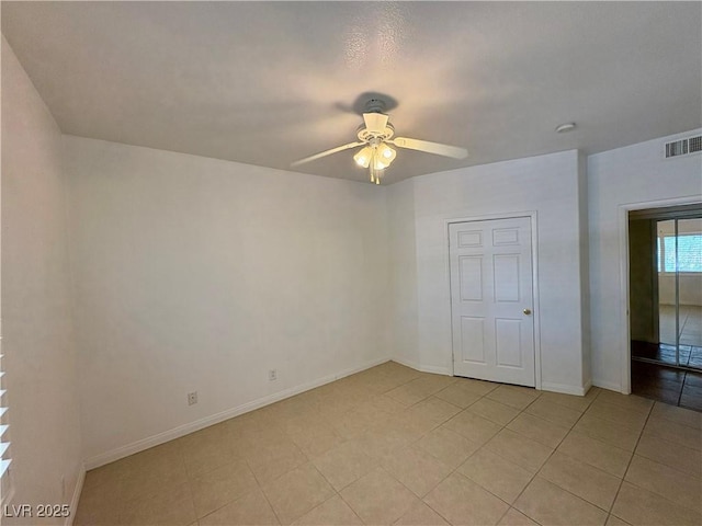 5751 E Hacienda Ave Unit 226, Las Vegas, NV 89122 - spare room featuring ceiling fan and light tile patterned floors