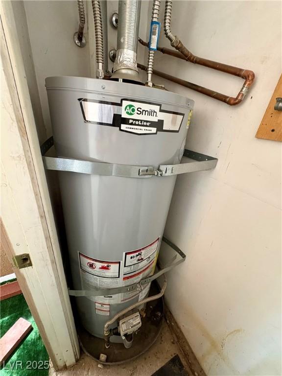 5751 E Hacienda Ave Unit 226, Las Vegas, NV 89122 - utility room featuring strapped water heater