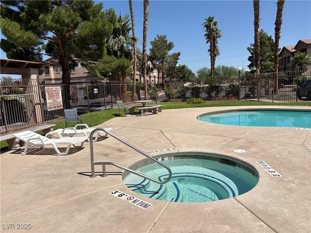 5751 E Hacienda Ave Unit 226, Las Vegas, NV 89122 - community pool with a hot tub and a patio area