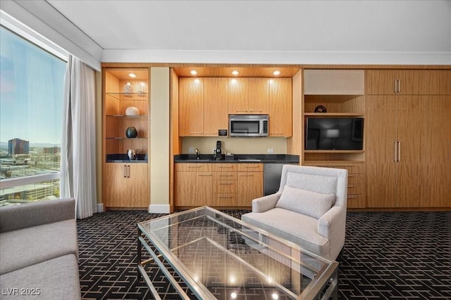 2000 N Fashion Show Dr Unit 3000, Las Vegas, NV 89109 - kitchen featuring stainless steel appliances, open shelves, dark countertops, and brick patterned flooring