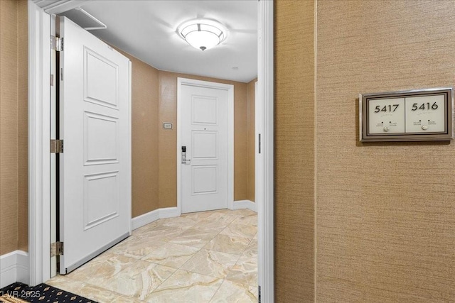 2000 N Fashion Show Dr Unit 5417, Las Vegas, NV 89109 - hall with baseboards and light marble finish floors