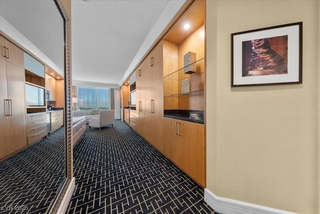 2000 N Fashion Show Dr Unit 5417, Las Vegas, NV 89109 - hallway featuring baseboards and built in features