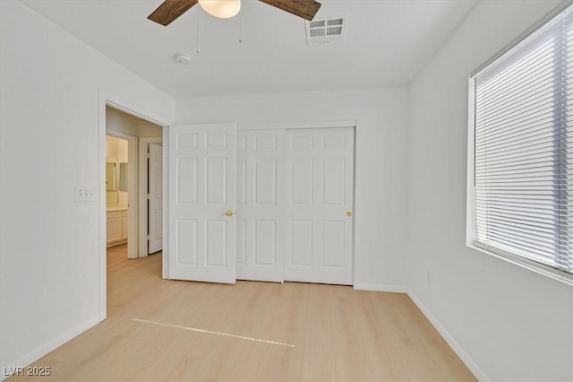 4708 Cohiba Way N, Las Vegas, NV 89031 - unfurnished bedroom featuring light wood-type flooring, a closet, and ceiling fan