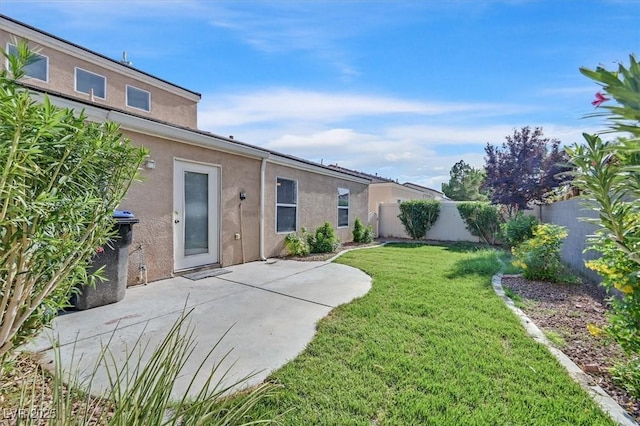 4708 Cohiba Way N, Las Vegas, NV 89031 - fenced backyard featuring a patio