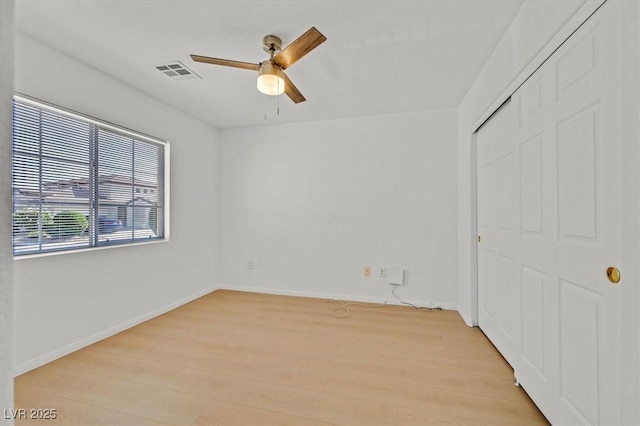 4708 Cohiba Way N, Las Vegas, NV 89031 - unfurnished bedroom featuring light wood-type flooring, a closet, and ceiling fan