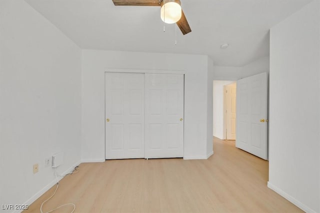 4708 Cohiba Way N, Las Vegas, NV 89031 - unfurnished bedroom with wood finished floors, a closet, and ceiling fan