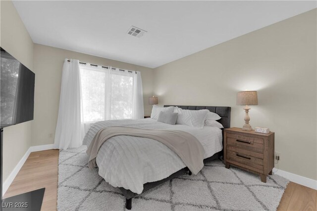 7837 Sea Rock Rd, Las Vegas, NV 89128 - bedroom with wood finished floors and baseboards