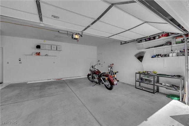 7837 Sea Rock Rd, Las Vegas, NV 89128 - garage with a garage door opener