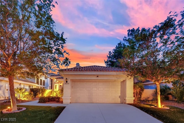 7837 Sea Rock Rd, Las Vegas, NV 89128 - view of front of house featuring a tiled roof, concrete driveway, stucco siding, an attached garage, and a chimney