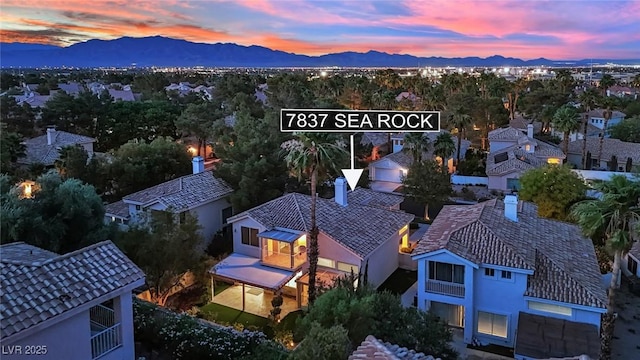 7837 Sea Rock Rd, Las Vegas, NV 89128 - aerial view of residential area with a mountain backdrop